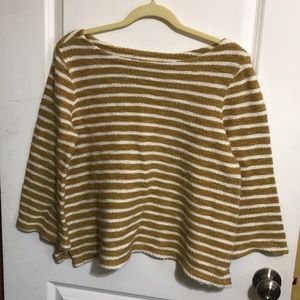 Mustard and white striped shirt.